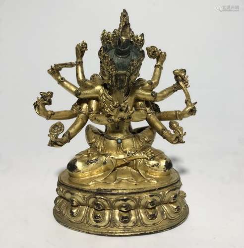 A GILT-BRONZE FIGURE OF USHNISHAVJAYA