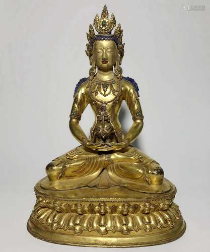 A GILT-BRONZE FIGURE OF AMITAYUS