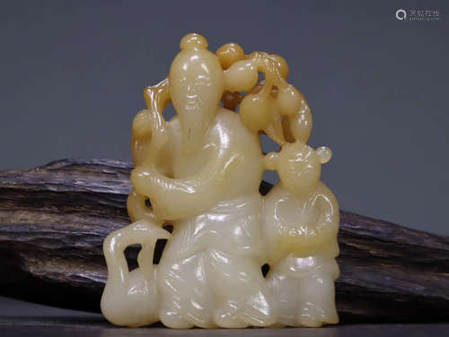 A QING HETIAN JADE ORNAMENT OF MAN AND GOOSE