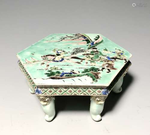 A GREEN-GLAZED END TABLE