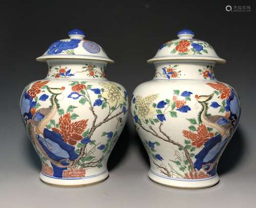 A PAIR OF FAMILLE VERTE JAR AND COVER