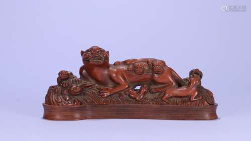 A Chinese Boxwood Beast Brush Rack