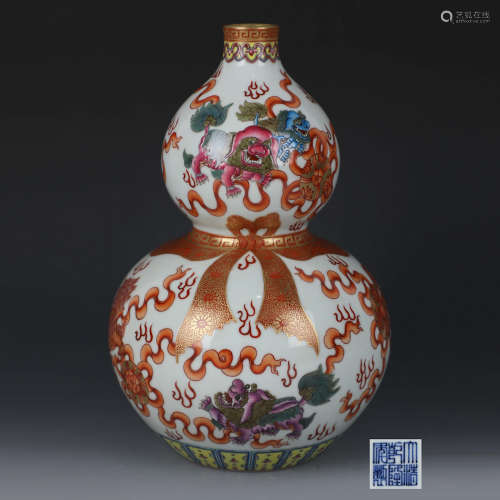 A Gilt Iron Red Lions Gourd-Shaped Porcelain Vase