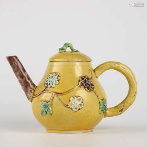 A Yellow Glazed Carved Floral Porcelain Ewer