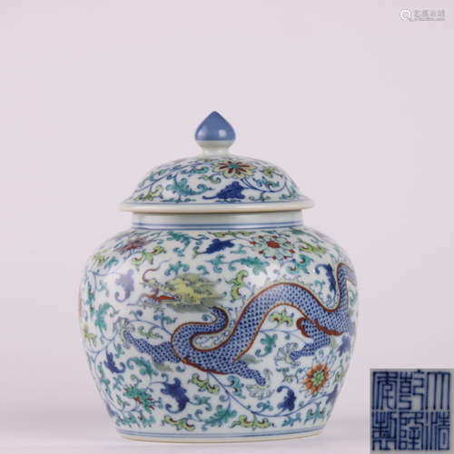 A Doucai Dragon And Flower Porcelain Jar And Cover