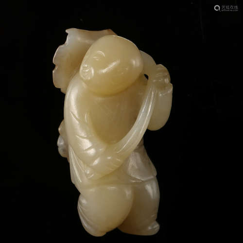 A Jade Carved ‘Boy-With-Lotus’ Ornament