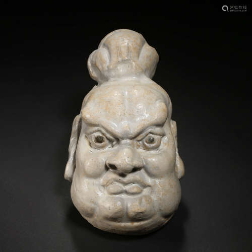 A Celadon Unusual Strength Man's Head Ornament
