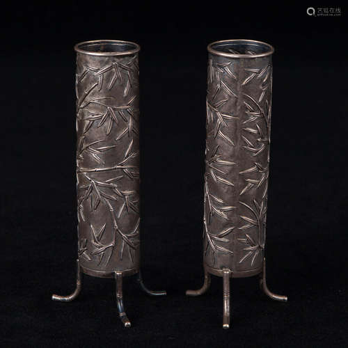 A Pair Of Silver Candlesticks