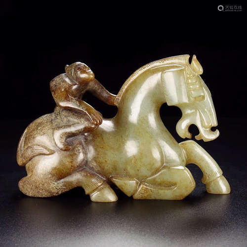 A Hetian Jade Carved ‘Riding Horse’ Ornament