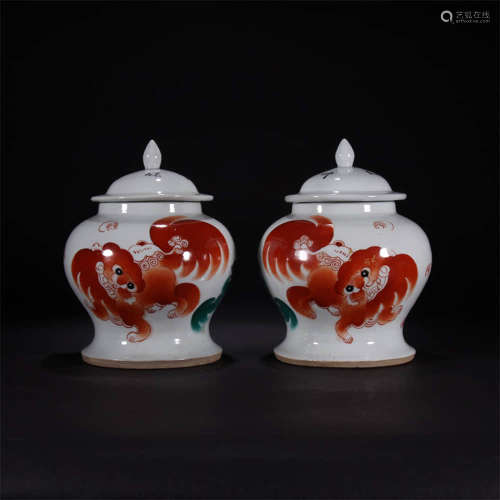 A Pair Of Blue And White Iron Red Lion Motif Porcelain Jars