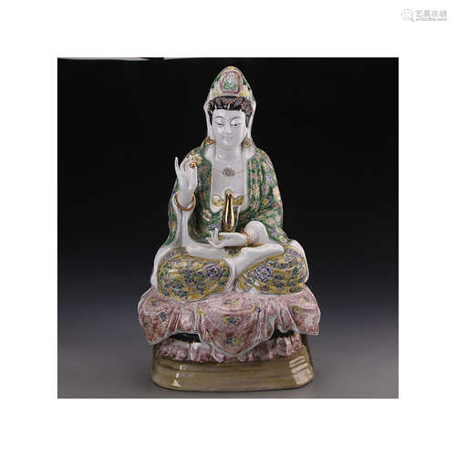 A Chinese Plain Tricolour Porcelain Figure Of Guanyin