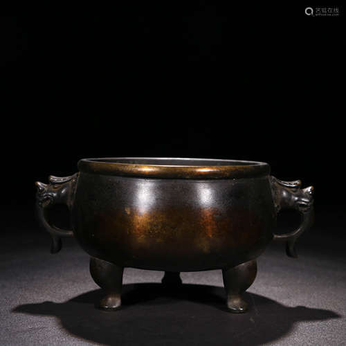 A Chinese Bronze Tripod Censer With Double Ears