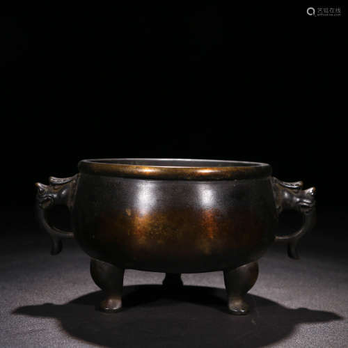 A Chinese Bronze Tripod Censer With Double Ears