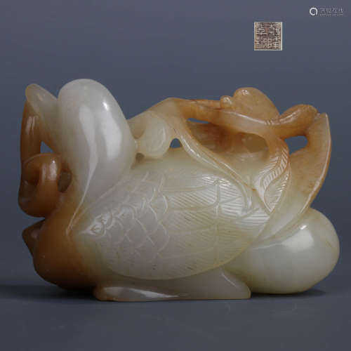 A Carved Hetian Jade ‘Duck And Lotus’ Ornament