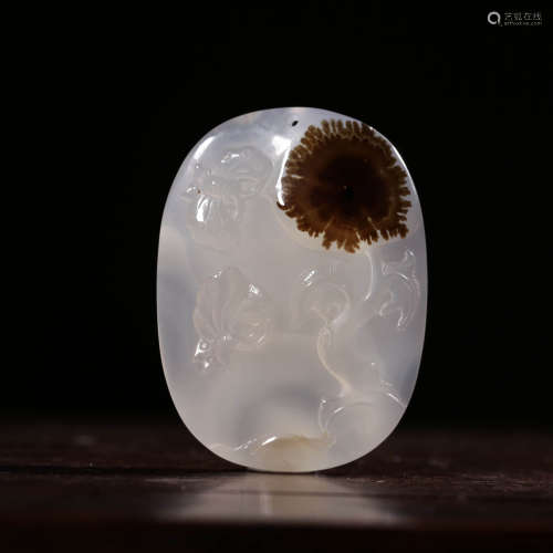 A Chinese Carved Agate ‘Butterfly and Flower’ Pendant