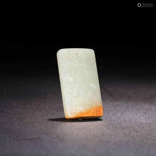 A Chinese Carved Hetian Jade ‘Hu People’ Pendant