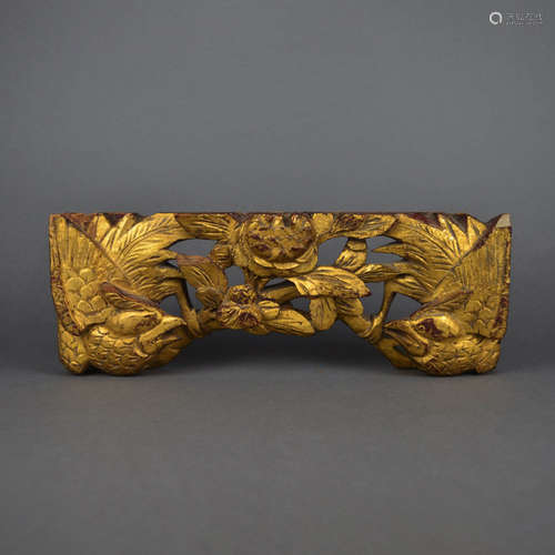 A Chinese Carved Gilt-Lacquered Wood Ornament