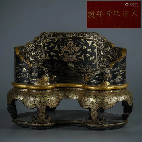 A Lacquered Dragon Throne.