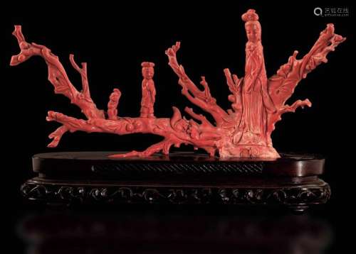 A Branch With Figures In Coral…
