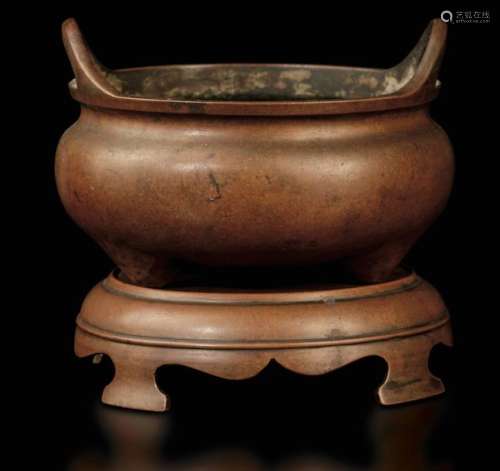 A Bronze Tripod Censer, China,…