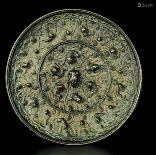 A Round Bronze Plaque, China, …
