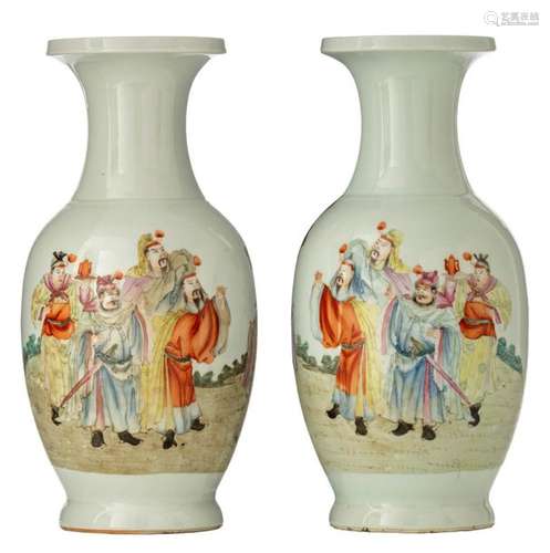 A pair of Chinese famille rose vases, decorated wi…