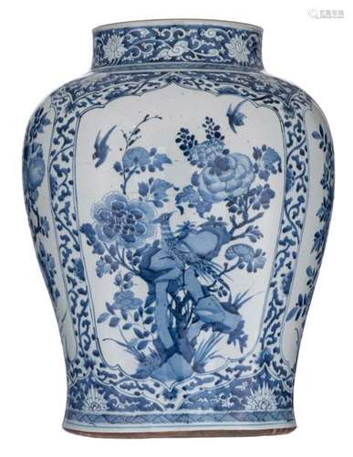 A Chinese blue and white floral decorated vase, th…