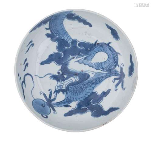 A Chinese blue and white dragon dish, probably for…