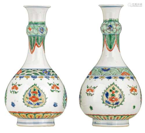 A pair of famille verte bottle vases, the leaf sha…