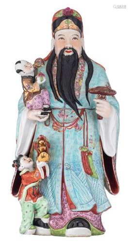 A Chinese polychrome decorated Lu Xing, holding a …