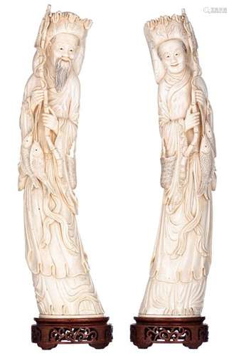 A pair of Chinese Canton ivory statues depicting a…