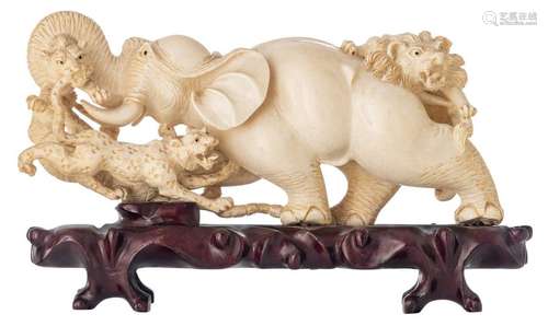 An Oriental briskly sculpted ivory group depicting…