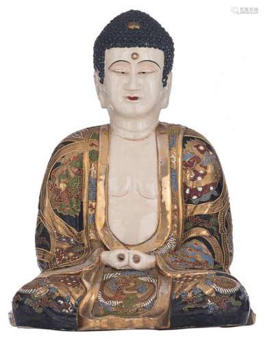 A large Japanese Satsuma figure of a seated Buddha…