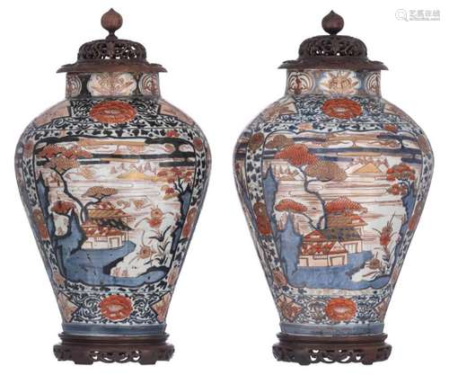 A pair of Japanese Imari covered vases, floral dec…