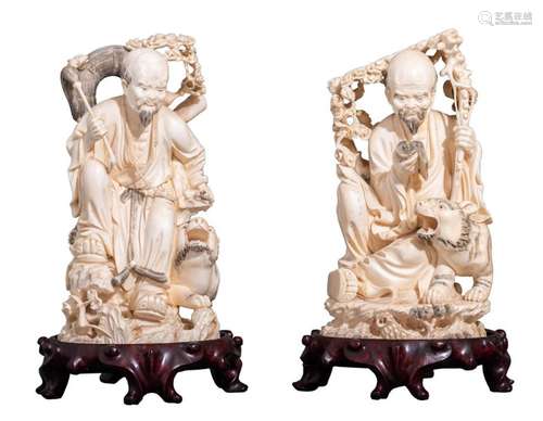 Two Chinese ivory Luohan figures decorated with bl…