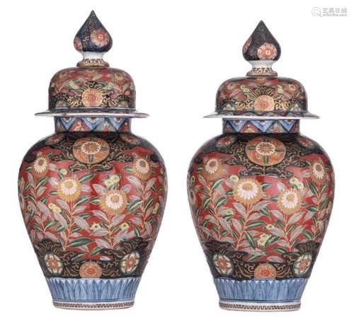 A pair of Japanese Imari covered vases, all around…