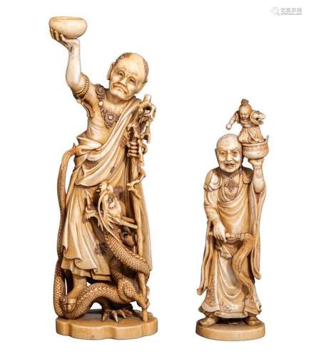 Two Japanese ivory 'Arhat' figures, decorated with…