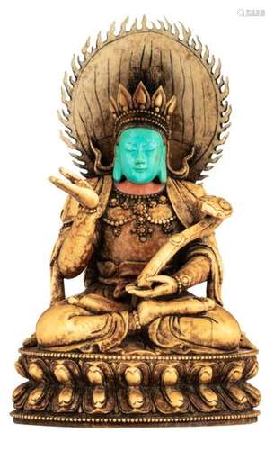 An ivory Sino Tibetan god in 'Abhaya mudra' postur…