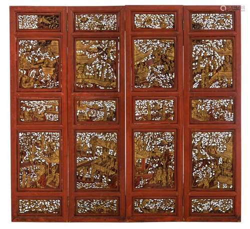 A Chinese red painted four panel screen, decorated…