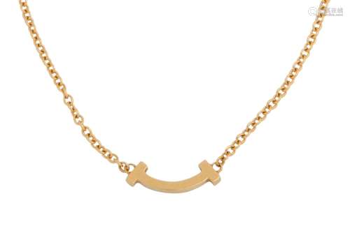 Tiffany & Co. | A gold 'Tiffany T Smile' bracelet
