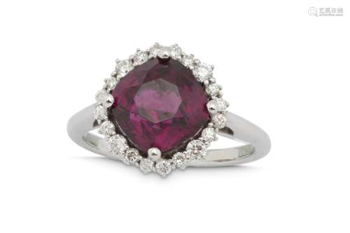 A purple spinel and diamond cluster ring