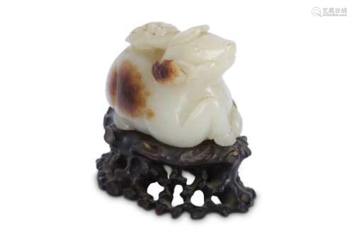 A CHINESE WHITE JADE CARVING OF A DEER.