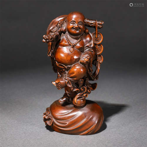 A boxwood buddha stature