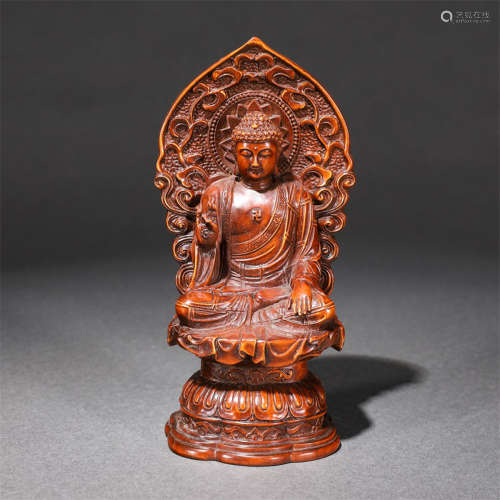 A boxwood buddha stature
