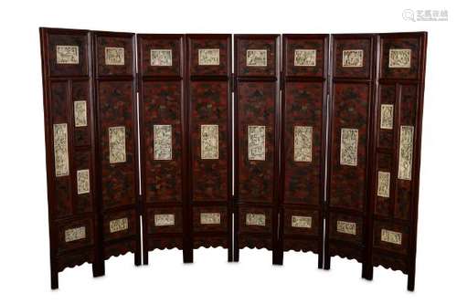 λ A CHINESE EIGHT PANEL IVORY-INSET LACQUER SCREEN.