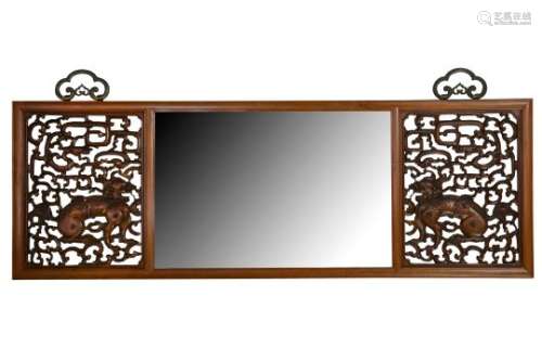 A PAIR OF CHINESE CARVED WOOD 'QILIN' PANELS MOUNTED AS A MIRROR.