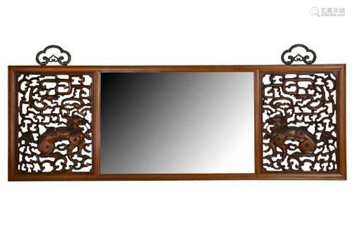 A PAIR OF CHINESE CARVED WOOD 'QILIN' PANELS MOUNTED AS A MIRROR.