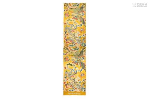 A LARGE CHINESE YELLOW-GROUND 'DRAGON AND PHOENIX' TEXTILE.