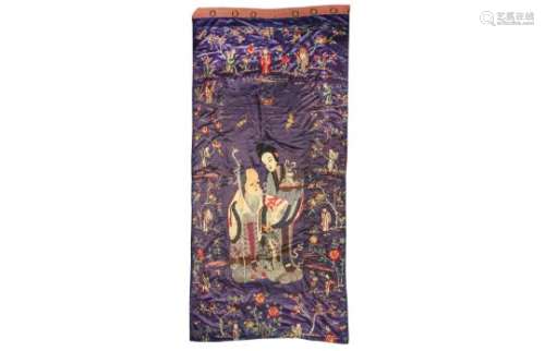 A CHINESE PURPLE-GROUND 'SHOULAO AND MAGU' EMBROIDERED SILK PANEL.