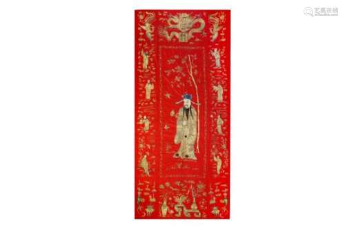 A LARGE CHINESE RED-GROUND SILK 'IMMORTALS' PANEL.